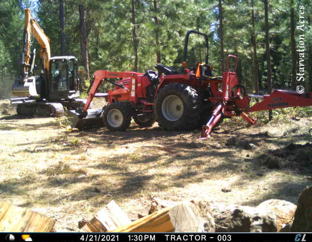 First view of heavy equipment working on our new driveway.