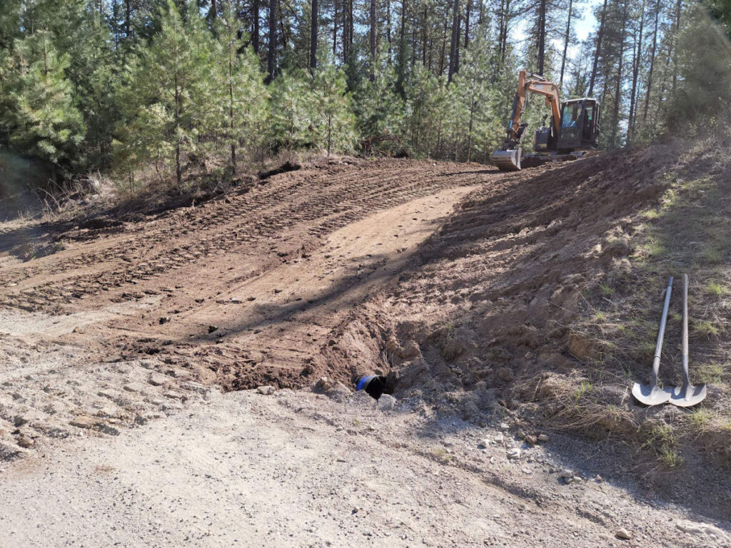 Driveway entrance before gravel.