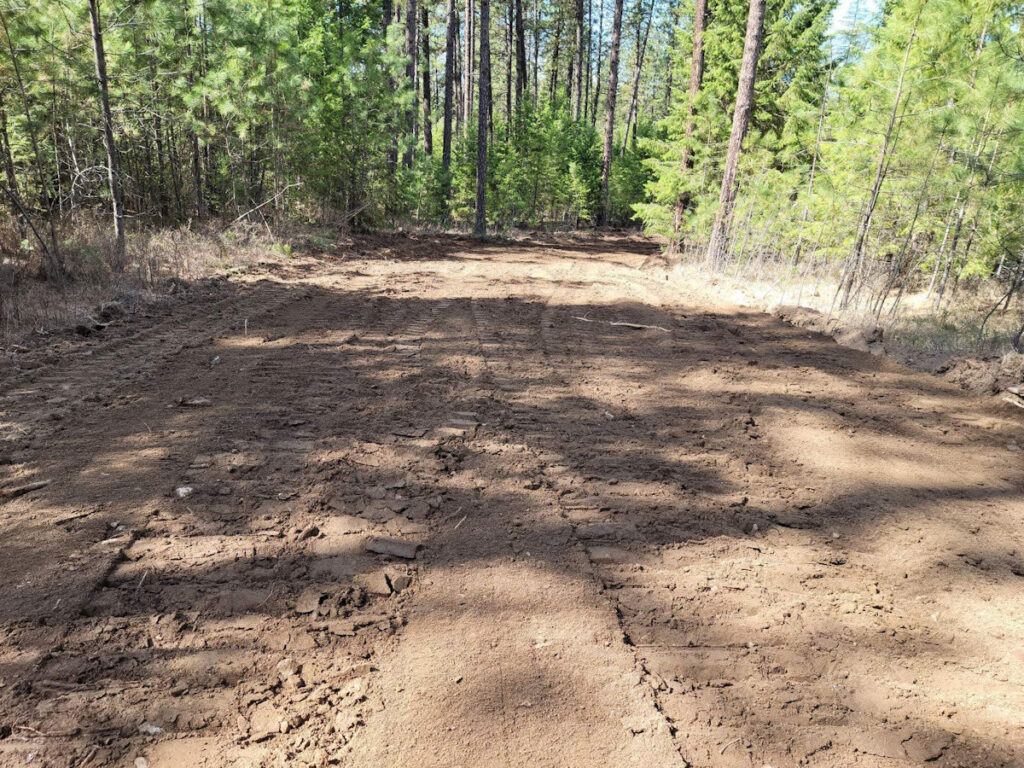 Wide & flat driveway path and Starvation Acres.